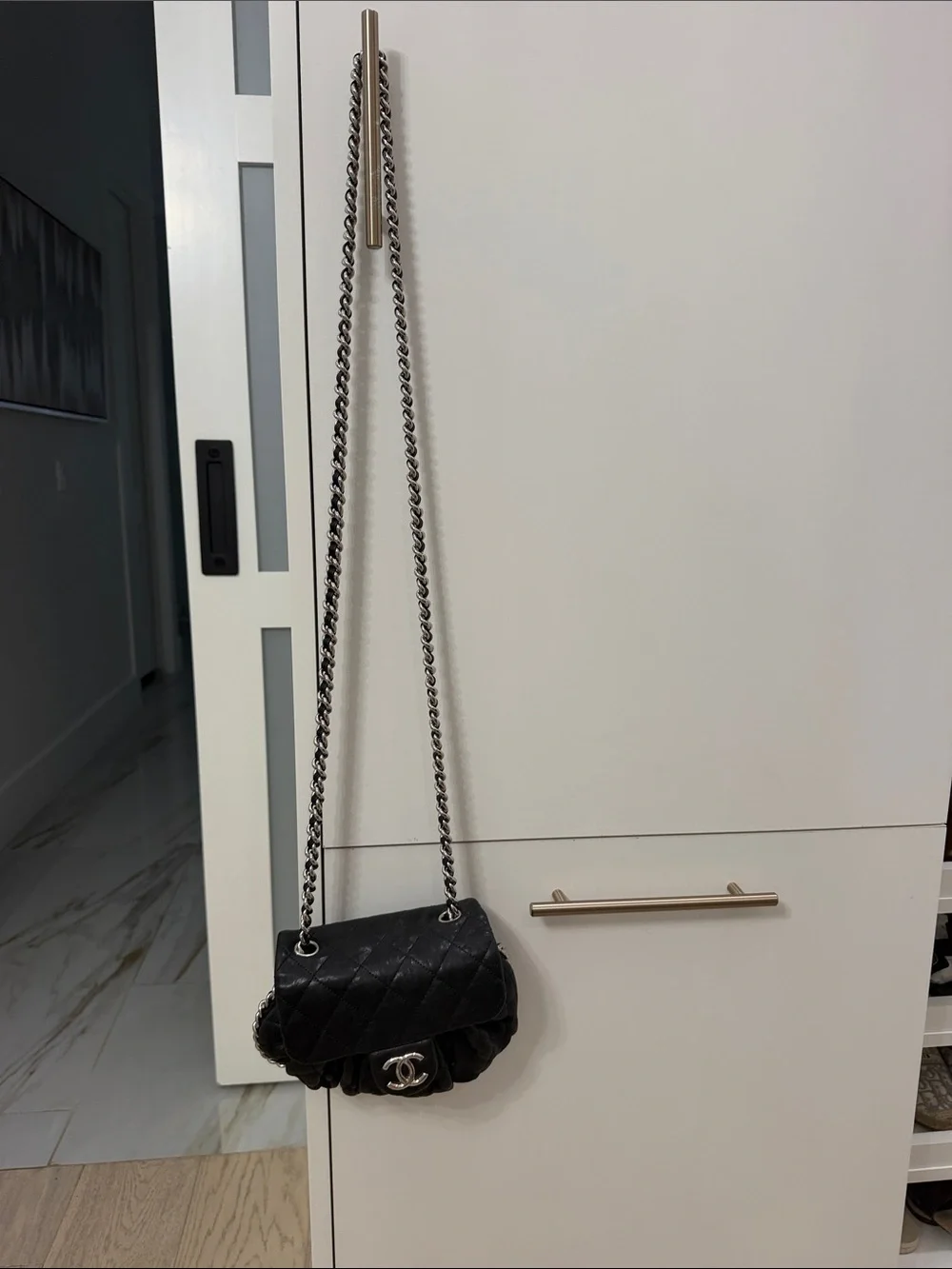 CHANEL Black Quilted leather chain around Crossbody with Silver CC Chain